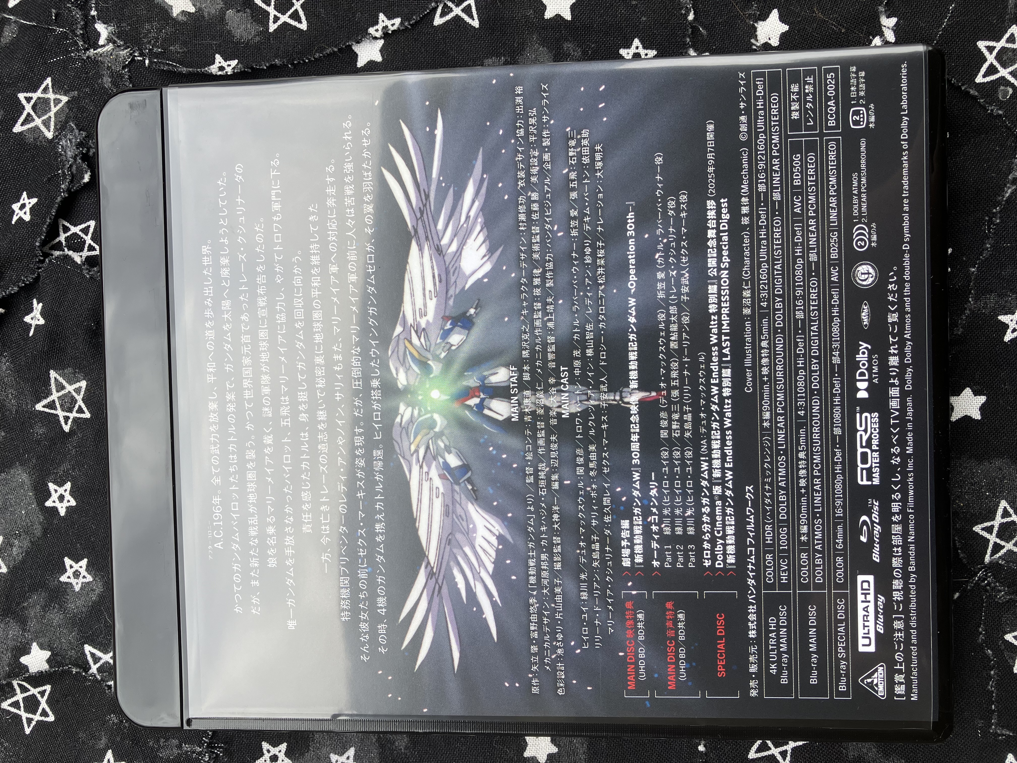 Back of Gundam wing endless waltz special edition dvd case with the summary, staff credits, list of features, and technical specifications for the Blu-ray discs